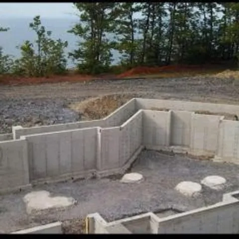 Finished poured concrete foundation walls with the forms removed